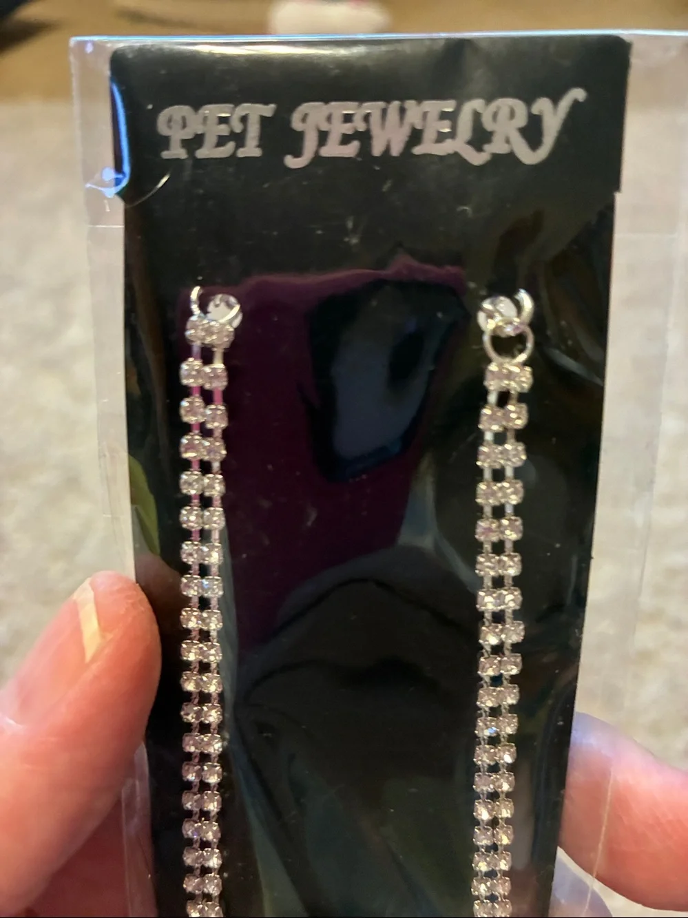 Dog Necklace is full of rhinestones. This necklace is a neck tie NWT